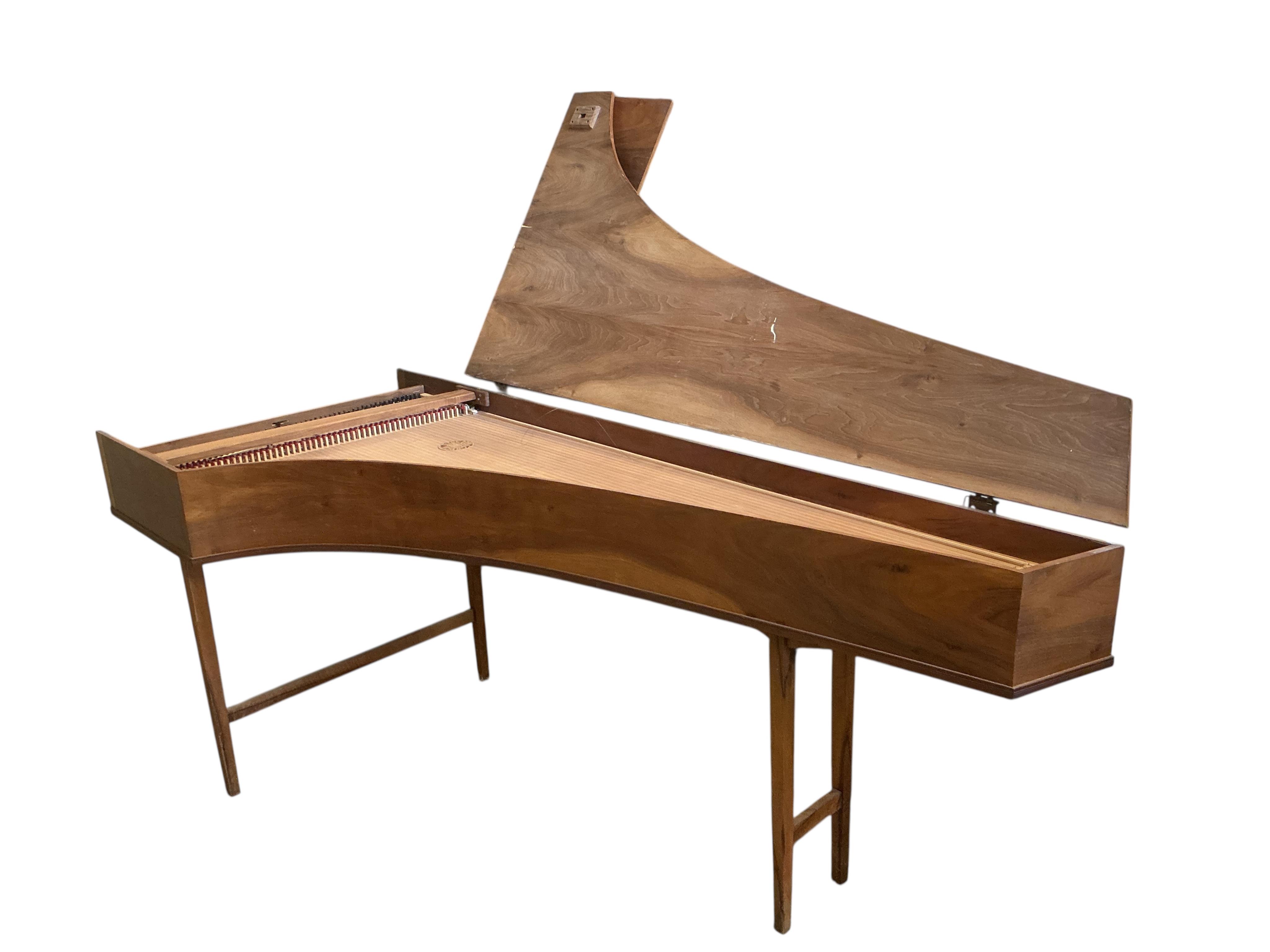 An Italian style single manual harpsichord built by Ian Gordon in 1989, in a walnut veneer case, Gordon is better known for his lutes, 54 note compass on small scale keys, and two stops, length 202cm